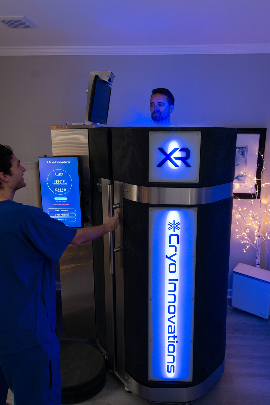 Medical staff monitoring patient during whole-body cryotherapy at THRIVE Alpharetta GA